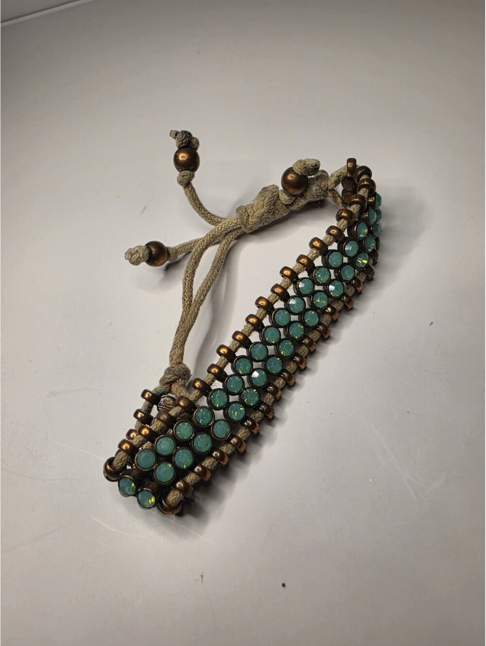 Beaded Bracelet Adjustable Cord Green And Gold Beaded. 7"